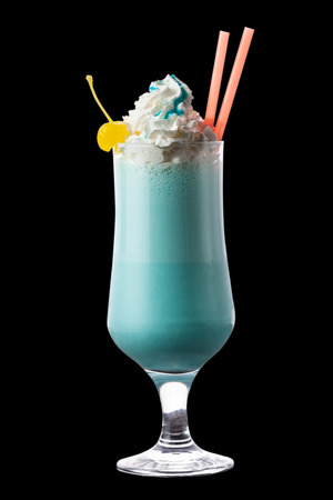 this is a blue summer cocktail on the black backgroundの写真素材