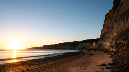 Beautiful beach sunrise shot during coastal hike,Cape Kidnappers located in Hawkes bay, North Island area of New Zealandの写真素材