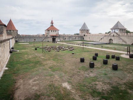 Inside courtyard of medieval fortress with guard towers, Moldova, Europe