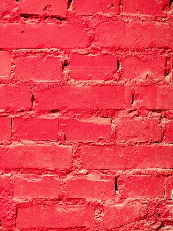 brick red painted wall close upの写真素材