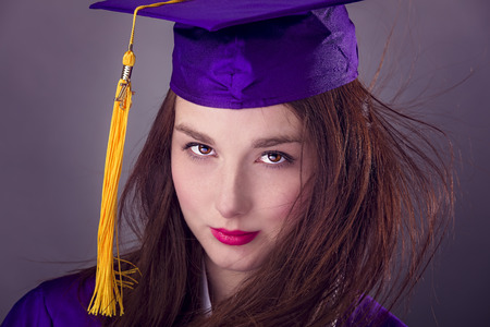 Portrait of female graduation during fashion shots.の写真素材