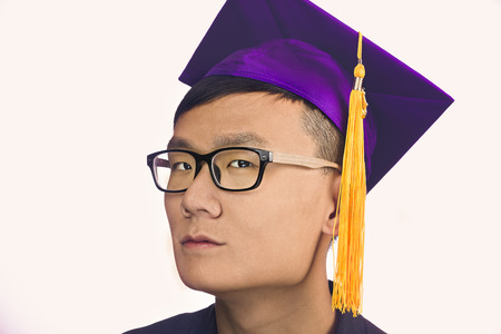 Portrait of young asian male after graduation.の写真素材