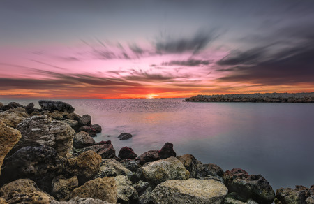 Colorful sunset over Mexican Bay at Naples, Floridaの写真素材