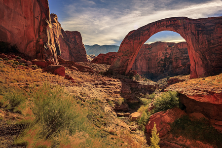 Beautiful rock formation in Glen Canyon near Lake Powell, Utah. Rocks formed unbelievable bridge called Rainbow Bridge National Monument.の写真素材