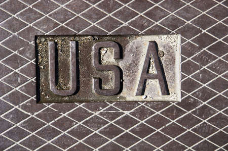 Letter USA on a steel manhole cover - landscape formatの写真素材