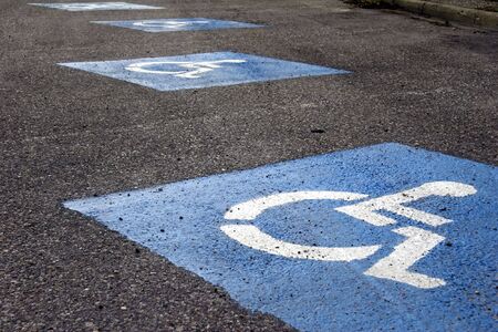 blue sign - parking lot for wheelchair driverの写真素材