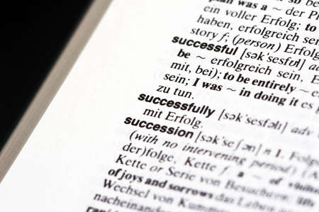 Macro shot of the word Successfully in a dictionaryの写真素材