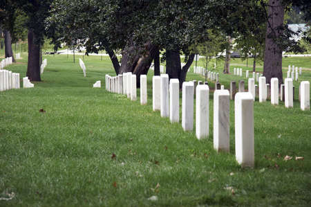 White gravestones in a row on Arlington National Cemetery, Washington DC, USAの写真素材