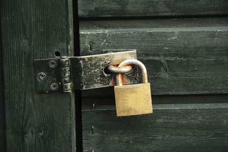 padlock with bolt at a gateの写真素材