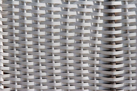 detail of roofed wicker beach chairの写真素材