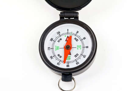 Compass with white face, red neadle, black case on white background