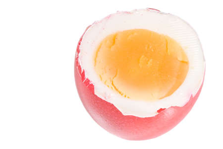Red Easter egg isolated on white backgroundの写真素材