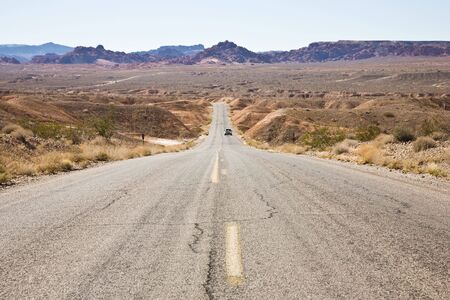 Road through desert zone in Valley of fire near Overton, Lake Mead, Nevada, USAの写真素材