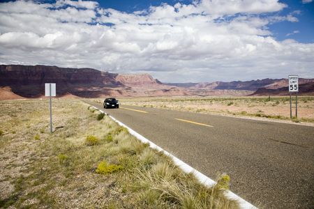 Highway in front of Vermillion Cliffs National Monument in Arizona, USAの写真素材