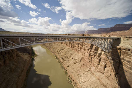 Navajo Bridge - Steel Arch Bridge over the Marble Canyon and the Colorado River in Arizona, USAの写真素材