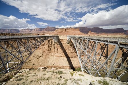 Navajo Bridge - Steel Arch Bridge over the Marble Canyon and the Colorado River in Arizona, USAの写真素材