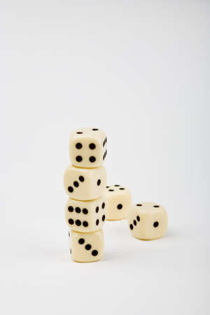 Rolling dice on white backgroundの写真素材