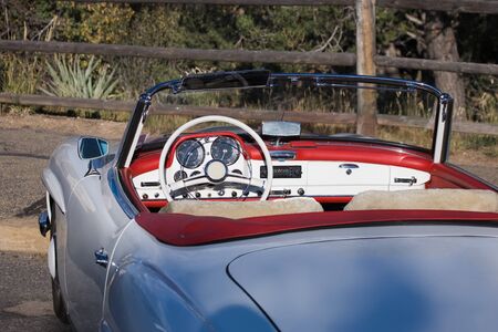 Vintage car - open Cabriolet white with red