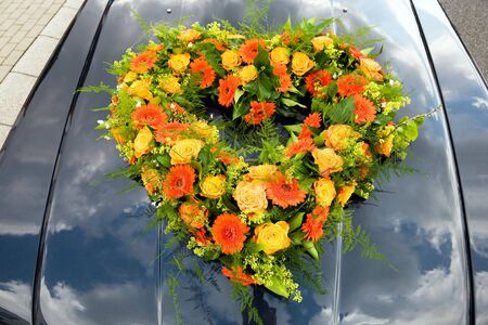 Floral arrangement on the hoof of a car