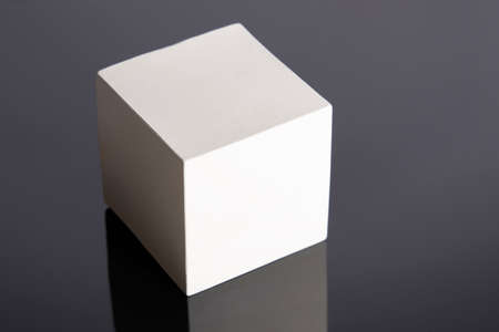 The Cube is a geometric figure, a white figure on a black background. Cube 3D.