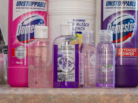 Bottles of hand sanitiser and bleach for working surfaces in a home to ensure no one can contract...