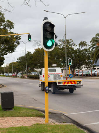 Traffic lights showing green for Go! at crossroads in George South Africa cbdのeditorial素材