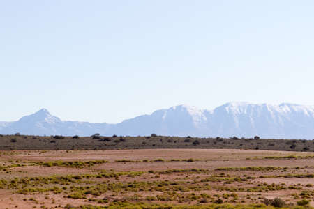 Snow covered Swartberg Mountains near Oudtshoorn on the first of Spring 2020の写真素材
