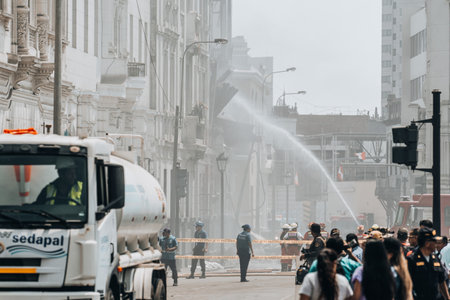 Lima, Peru - January 20 2023: Firefighters trying to control historical buildingのeditorial素材
