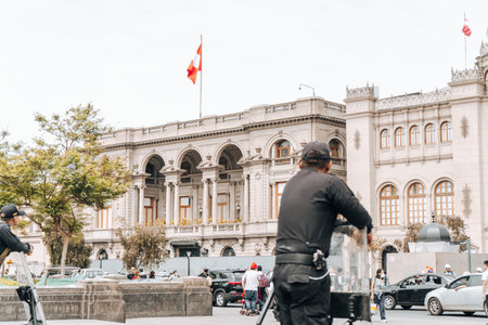 Lima, Peru - January 20, 2023: Police men on the streets at San Martin Squareのeditorial素材