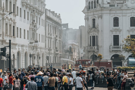 Lima, Peru - January 20 2023: Firefighters trying to control historical buildingのeditorial素材