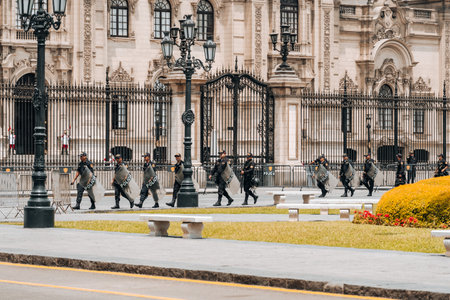 Lima, Peru - January 20, 2023: Police men on the streets at San Martin Squareのeditorial素材