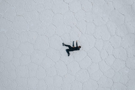 Drone Aerial Photo of person Bolivia Salar de Uyuni Salt Flatsの写真素材