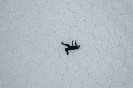 Drone Aerial Photo of person Bolivia Salar de Uyuni Salt Flatsの写真素材