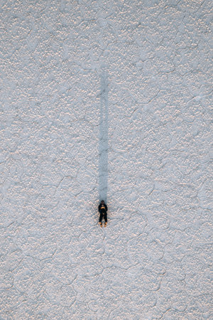 Drone Aerial Photo of person Bolivia Salar de Uyuni Salt Flatsの写真素材