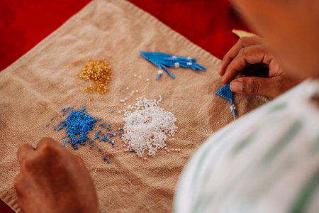Embera Community of Medellin making Jewelry in Colombiaの写真素材