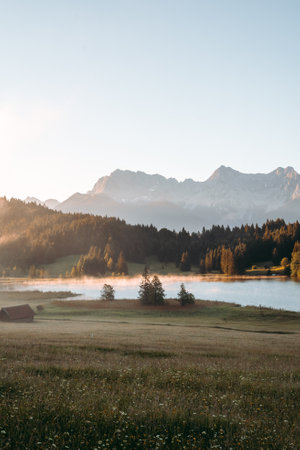 Amazing foggy Sunrise at Geroldsee, also Wagenbruchsee, Bavaria, Germany Europeの写真素材