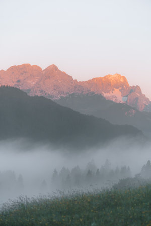 Morning view of Zugspitze at a foggy sunrise at Geroldsee, Bavaria Germanyの写真素材