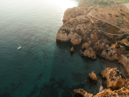 Aerial Drone view of Ponta da Piedade during sunset in Lagos Algarve, Portugalの写真素材