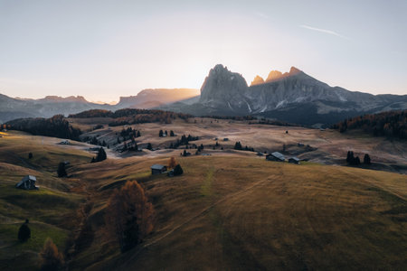 Drone photo at Alpe di Siusi sunrise in Dolomites South Tyrol Italy in Autumnの写真素材