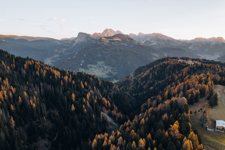 Drone photo at Alpe di Siusi sunrise in Dolomites South Tyrol Italy in Autumnの写真素材