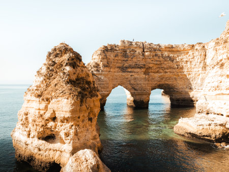Viewpoint of the beach and Arch at Praia da Marinha, Algarve, Portugalの写真素材