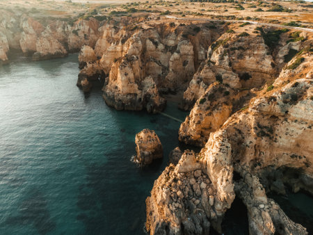 Aerial Drone view of Ponta da Piedade during sunset in Lagos Algarve, Portugalの写真素材