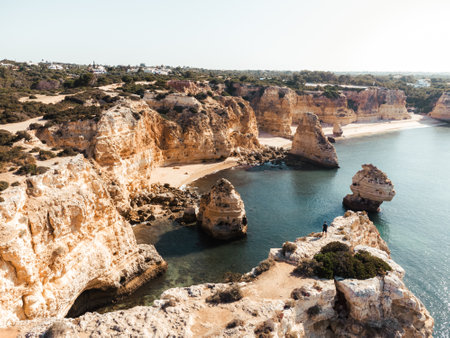 Viewpoint of the beach and Arch at Praia da Marinha, Algarve, Portugalの写真素材