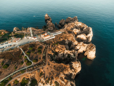 Aerial Drone view of Ponta da Piedade during sunset in Lagos Algarve, Portugalの写真素材
