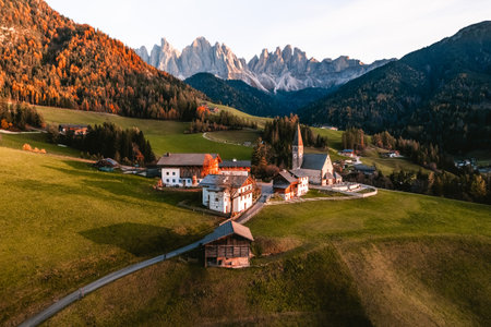 Drone photo of church and village in Santa Maddalena Magdalena Dolomites Italyの写真素材