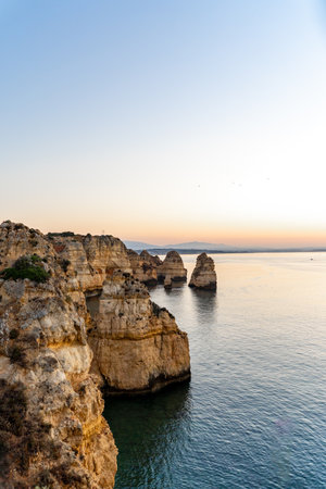 Wonderful view of Ponta da Piedade during sunrise in Lagos, Algarve, Portugalの写真素材