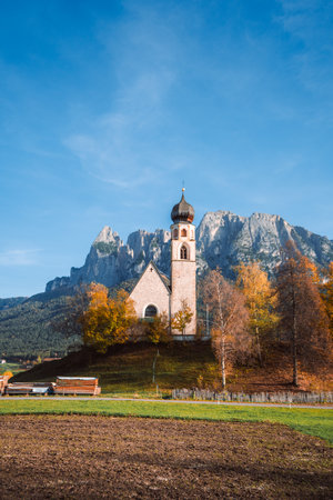 Bright photo of St. Constantine church in Dolomites, Trentino Alto Adige Italyの写真素材