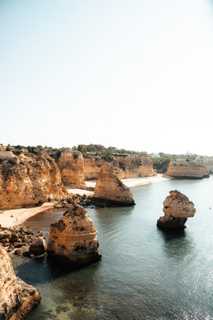 Viewpoint of the beach and Arch at Praia da Marinha, Algarve, Portugalの写真素材