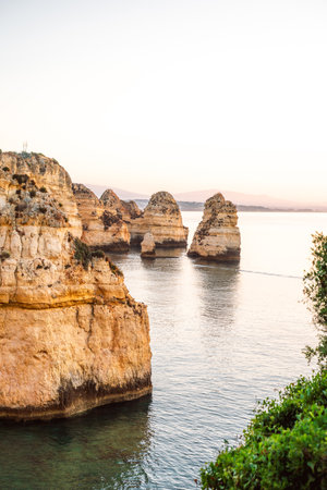Wonderful view of Ponta da Piedade during sunrise in Lagos, Algarve, Portugalの写真素材