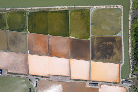 Aerial drone photo of colourful salt flats textures in Phetchaburi, Thailandの写真素材